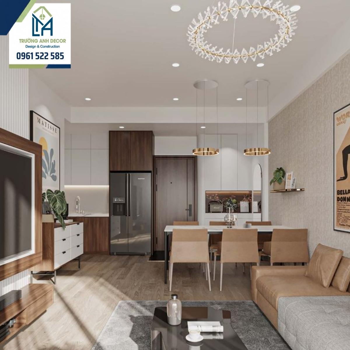 Phòng khách liền bếp căn hộ phong cách Bắc Âu với nền trắng, bàn ăn gỗ sồi và sofa vải màu kem